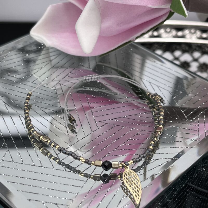 Bransoletka skrzydło sznurek kamyki 316L